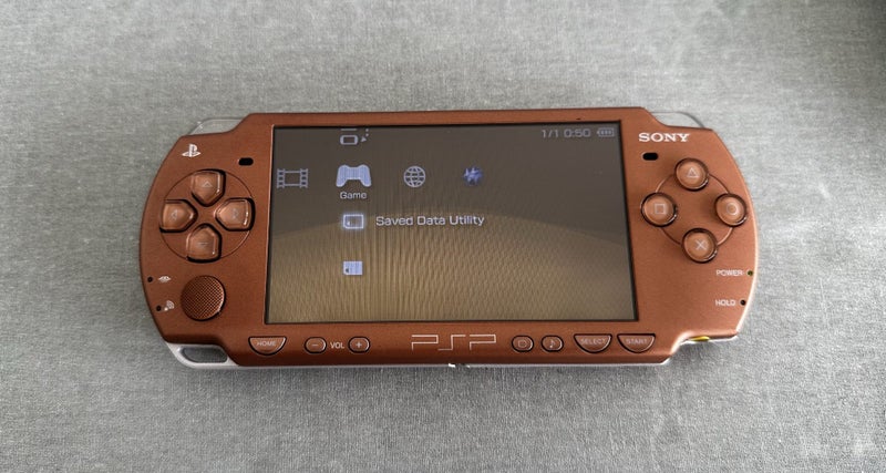 PlayStation Portable (PSP) 2000 – Metallic Copper | 64GB | Fully Set Up Carousel 2