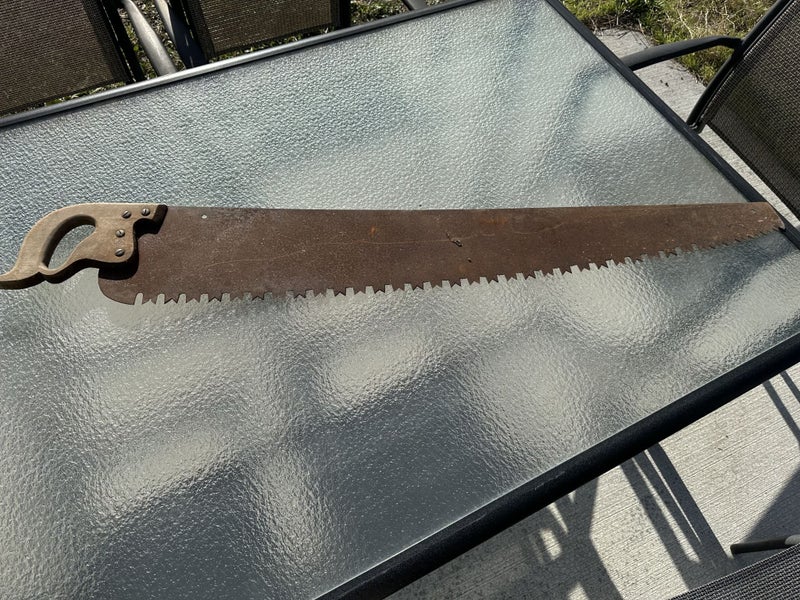 Vintage Cross Cut Saw Carousel 1