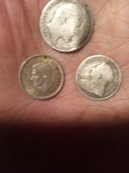 Three silver threepence and a silver sixpe ce Carousel 1