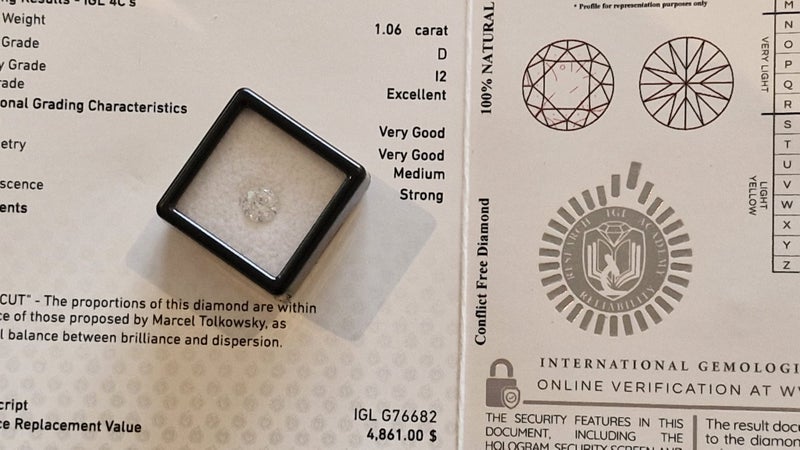 $1 RES * Valuation $8,057.00 * 1.06ct Round Large White Diamond Loose IGL CERT Carousel 2