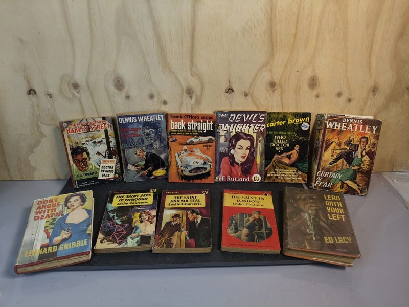 Great collection of murder mysteries.look at the titles Carousel 1