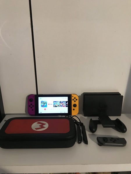 Nintendo switch + extras Carousel 1