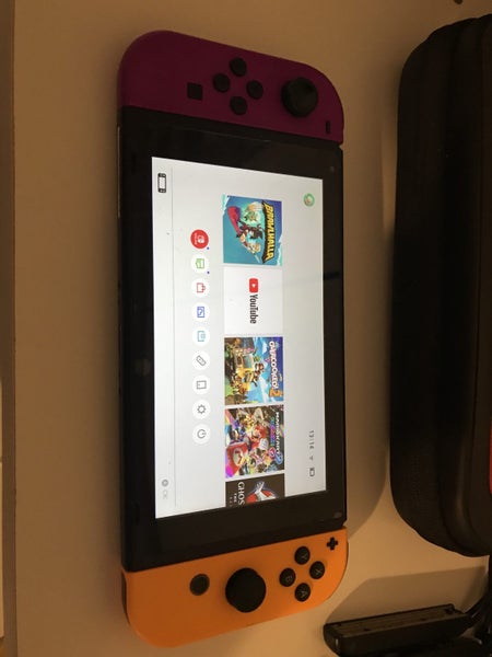 Nintendo switch + extras Carousel 2