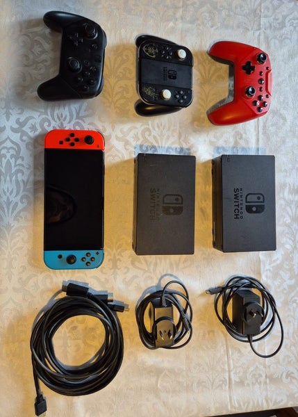 OLED Nintendo switch + Games & Acessories Carousel 1