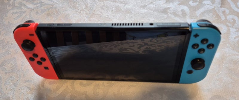 OLED Nintendo switch + Games & Acessories62863227648259112
