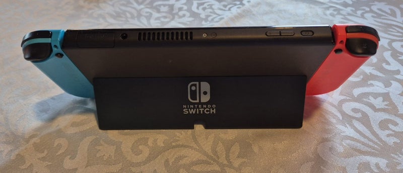 OLED Nintendo switch + Games & Acessories62863227648259113