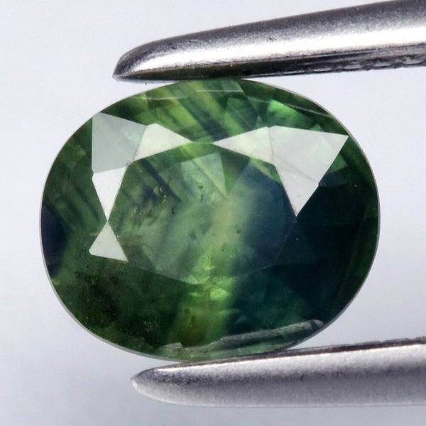 $1 RES * Buy Now $1,250.00 * 0.79ct Australia Blue Green Sapphire Loose Gemstone Carousel 1