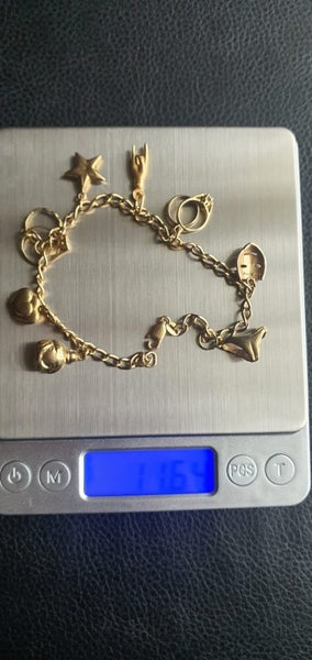 9ct gold charm bracelet Carousel 2