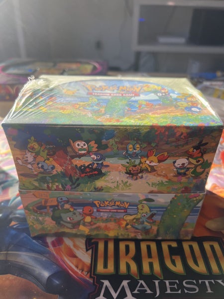 Pokémon Celebration Mini Tin Display $1NR Carousel 1
