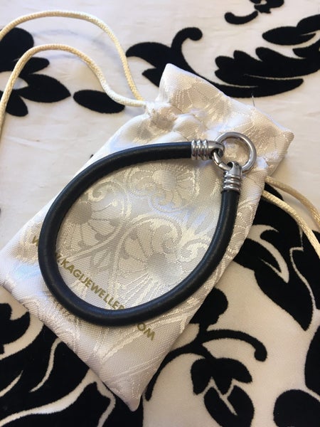 KAGI Rare Leather Bangle Carousel 1