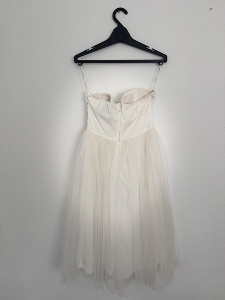 White mid-length strapless dress Carousel 2