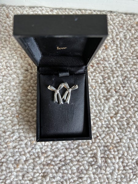 Karen Walker Stud Bow Earrings Silver Carousel 1