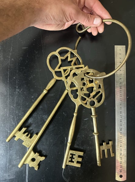 $1 reserve. Very large set of 4 vintage brass skeleton keys./ castle keys. Carousel 2