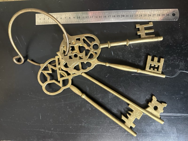 $1 reserve. Very large set of 4 vintage brass skeleton keys./ castle keys. Carousel 1