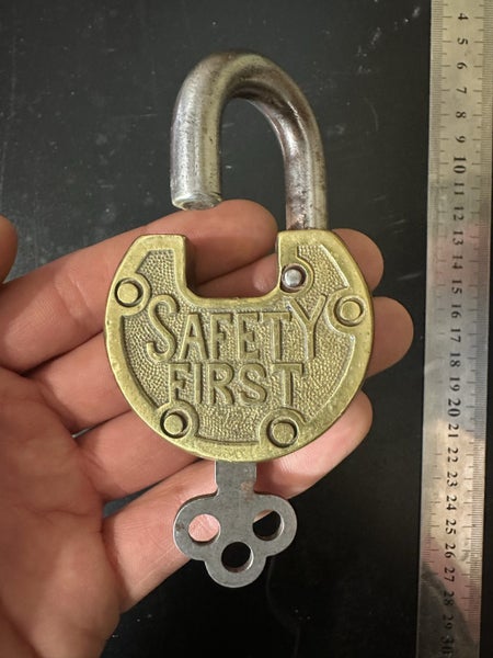 $1 reserve. Beautiful condition vintage "SAFETY FIRST" brass padlock with key. Carousel 2