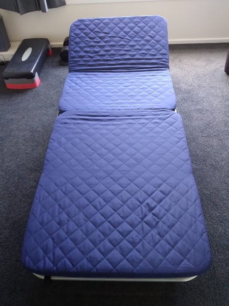 Folding bed with mattress and adjustable headrest Carousel 1