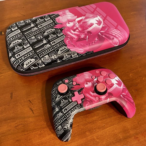 Nintendo Switch Pro Controller + Console Travel Case Carousel 1