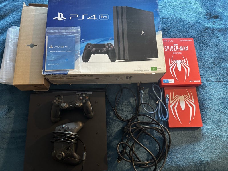 Sony PlayStation 4 PS4 4K Pro 1TB Console with spiderman PS4 SPECIAL EDITION Carousel 1