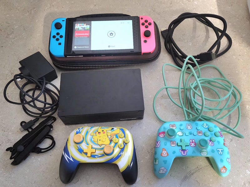 Nintendo switch v2 plus accessories 2 controllers, 256 gb micro sd card Carousel 1