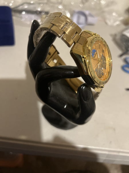 Beautiful gold coloured watch Carousel 2