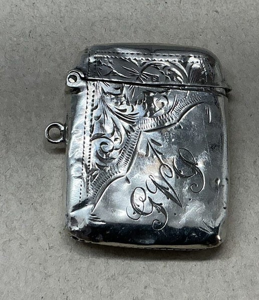 DATED 1917 - STERLING SILVER VESTA CASE, WILL HOLD A CHAIN FOR A NECKLACE.