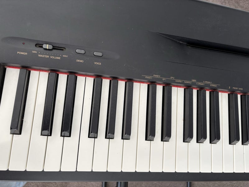 Yamaha digital piano with stand and chair62865828607234112