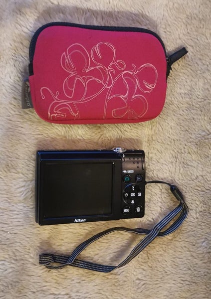 Vintage Nixon CoolPix S2500 12MP Digital Camera Carousel 10