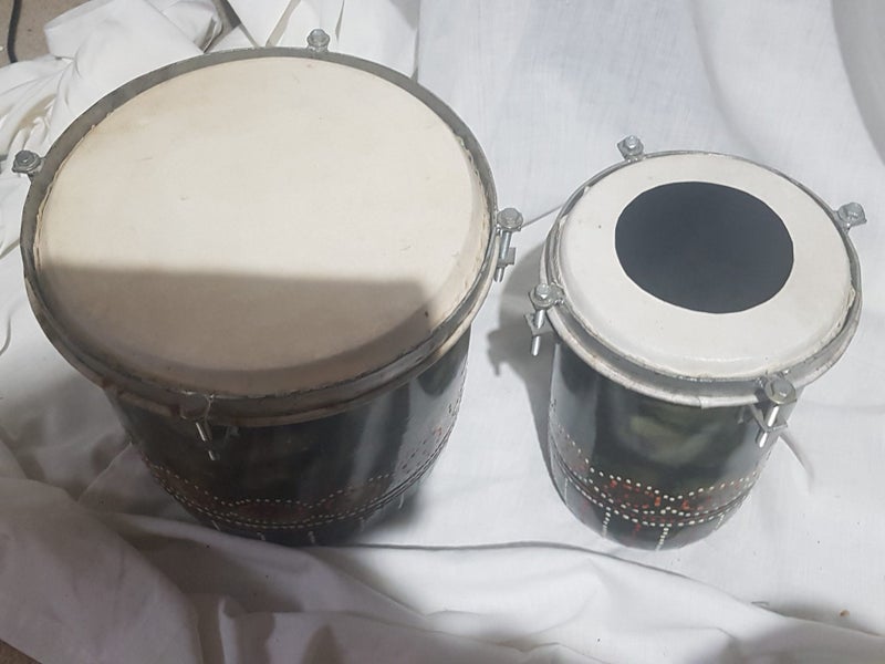 Small ethnic drums. 9" and 5 1/2 " diameter. Look amazing. Sound great. Carousel 1