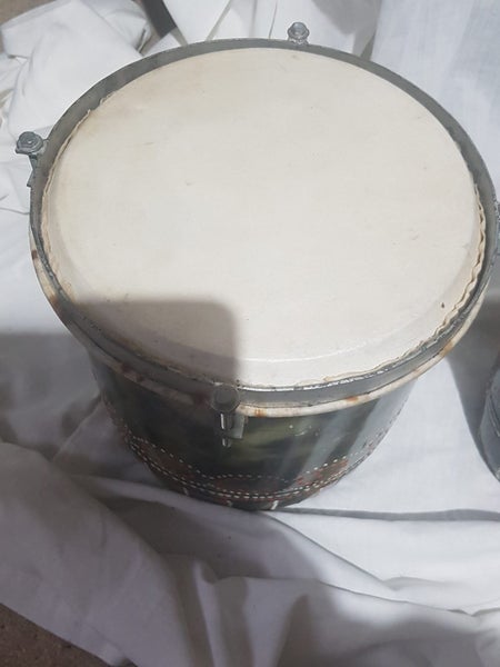 Small ethnic drums. 9" and 5 1/2 " diameter. Look amazing. Sound great. Carousel 2