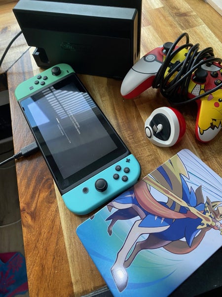 Nintendo Switch + Pokemon Sword + accessories Carousel 1