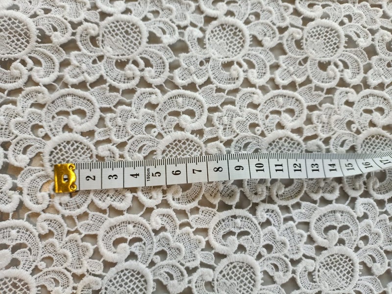 Piece of White Lace Fabric Carousel 1