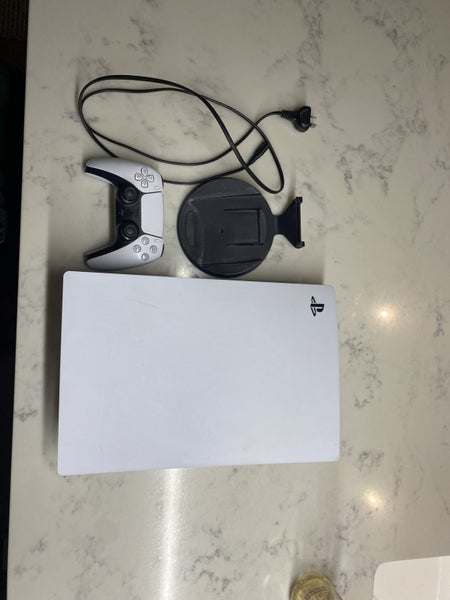 Ps5 disc with a 1 terabyte chip and Travel box Carousel 1