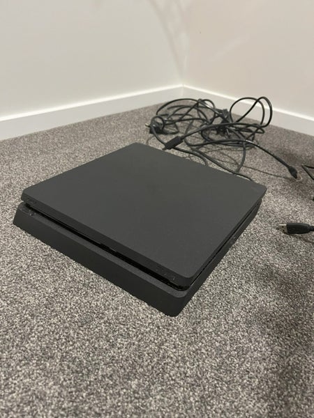 PS4 console with 4 controllers Carousel 2