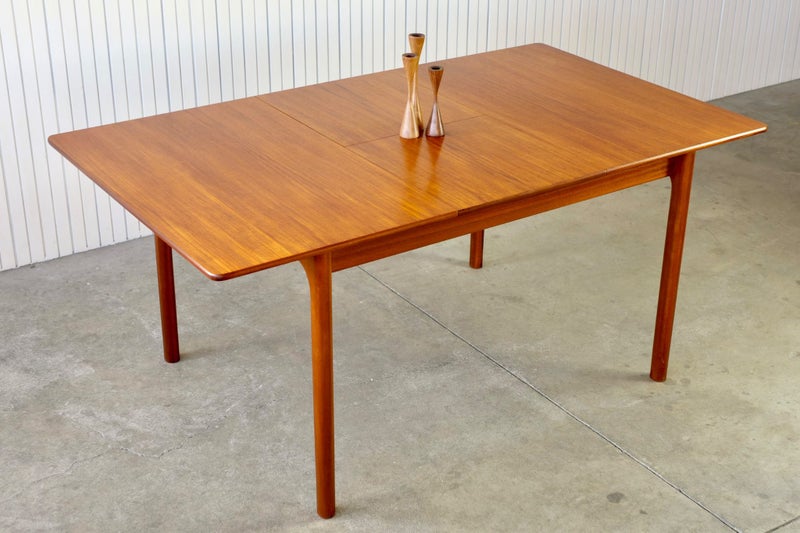 A MID-CENTURY DANISH MODERN MCINTOSH TEAK DINING TABLE Carousel 1