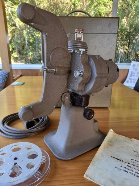 Vintage Bell & Howell 606H projector62867850272259111