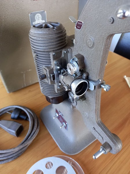 Vintage Bell & Howell 606H projector62867850272259112