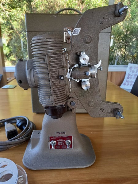 Vintage Bell & Howell 606H projector62867850272259113