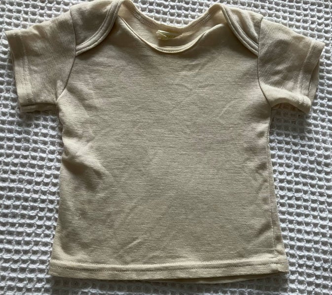 Cream merino short sleeve singlet by Liberty, size 00 Carousel 1