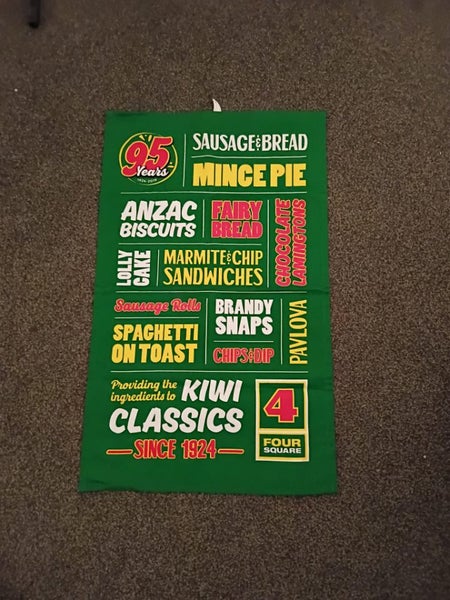 Four Square tea towel. Green Carousel 1
