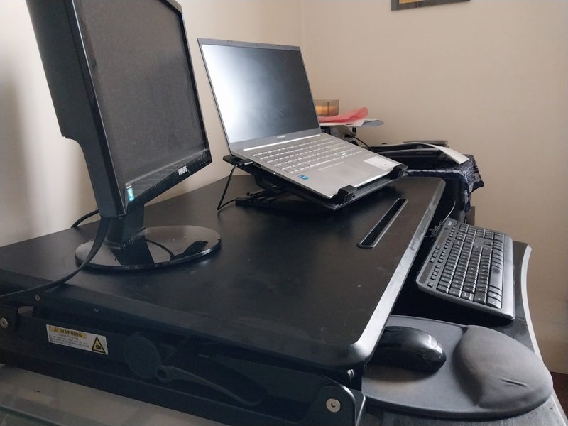 Loctek MT101-M adjustable height desk top Carousel 1