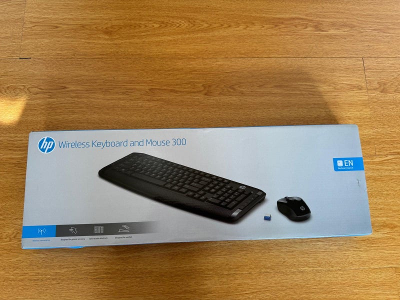 Hewlett Packard Wireless Keyboard and Mouse 300 Combo Carousel 1
