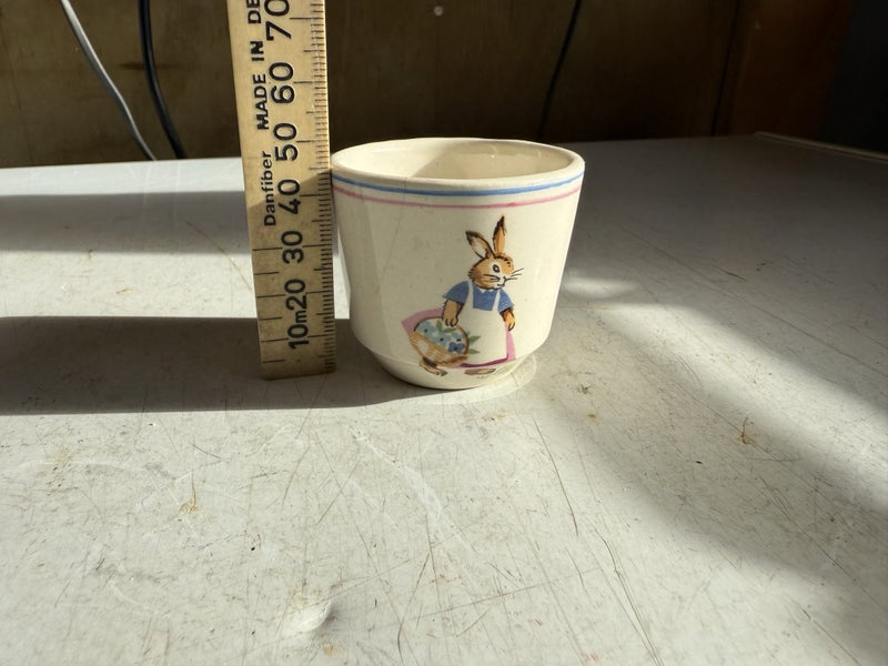 vintage Crown Lynn egg cup featuring a rabbit design62863237850371114