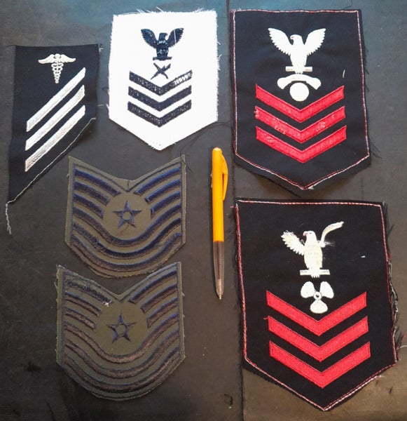 ELABORATE STRIPES PATCHES ETC PERHAPS MILITARY ? Carousel 1