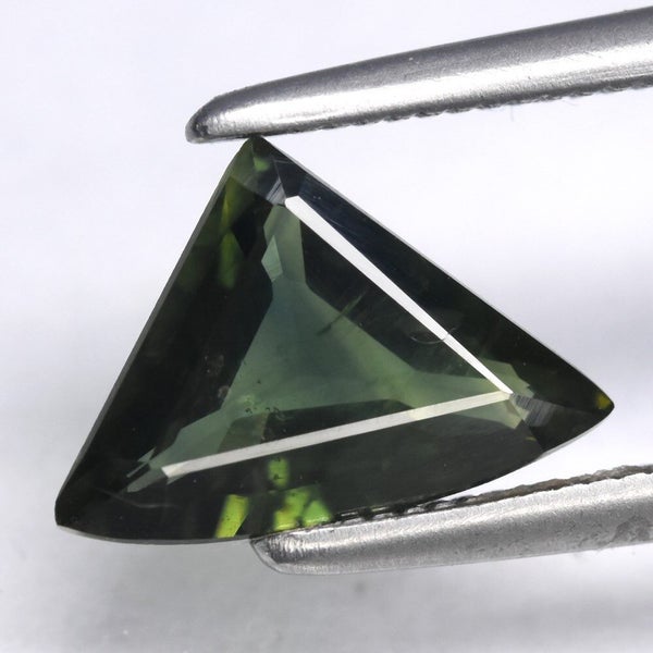 $1 RES * Buy Now $1,250.00 * 0.96ct Trillion SI1 Green Sapphire Loose Gemstone Carousel 1