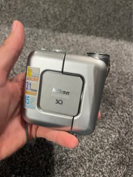 NIKON COOLPIX SQ DIGI CAM - FULL WORKING + CHARGING STAND62863868243074111