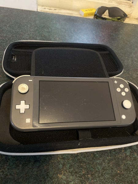 Nintendo switch lite (Grey) Carousel 1