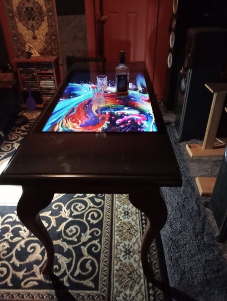 Table with 4k TV62939544749314111