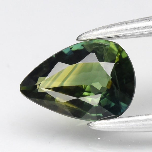 $1 RES * Buy Now $1025.00 * 0.39ct Unheated Pear Green Sapphire Loose Gemstone Carousel 1