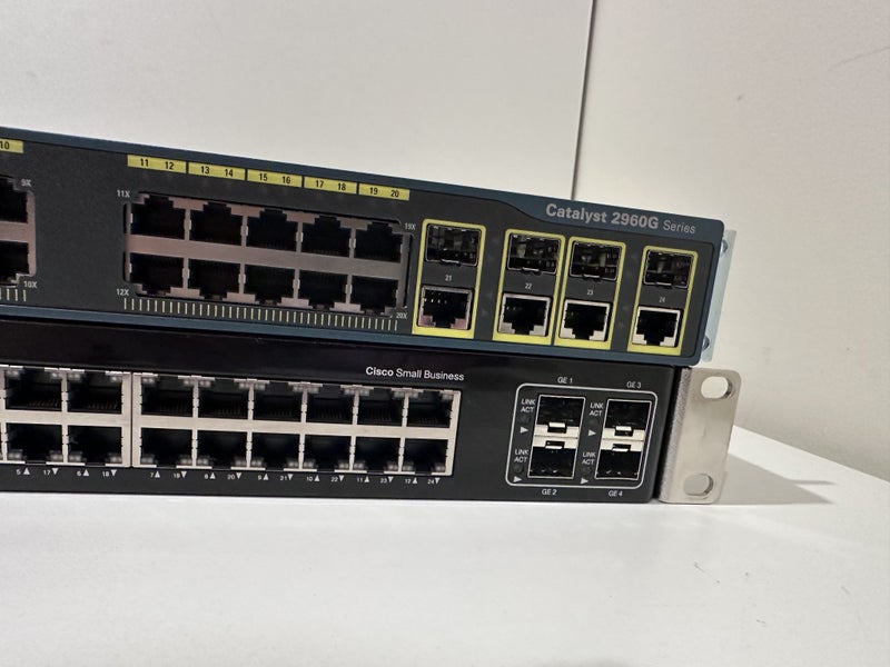 $1 Res Two x Cisco Switches - Cisco Catalyst 2960 and Cisco SGE2000 24-PORT62934719387651112
