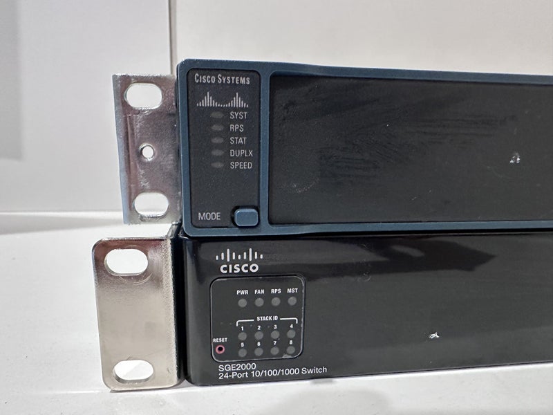 $1 Res Two x Cisco Switches - Cisco Catalyst 2960 and Cisco SGE2000 24-PORT62934719387651111
